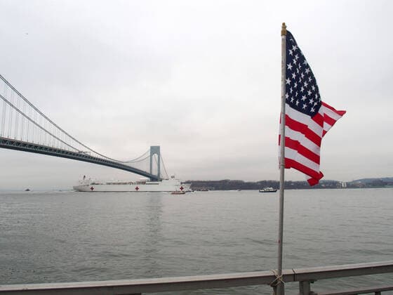 March 30, 2020, New York, New York, USA: The Hospital Ship USNS Comfort arrives in New York. USNS Comfort sail under the Verrazano Narrows bridge then proceeds to go past the Statue of Liberty to it s berth at pier 90 on the Westside of Manhattan New York USA - ZUMAct2_ 20200330_zaf_ct2_015 Copyright: xBrucexCotlerx