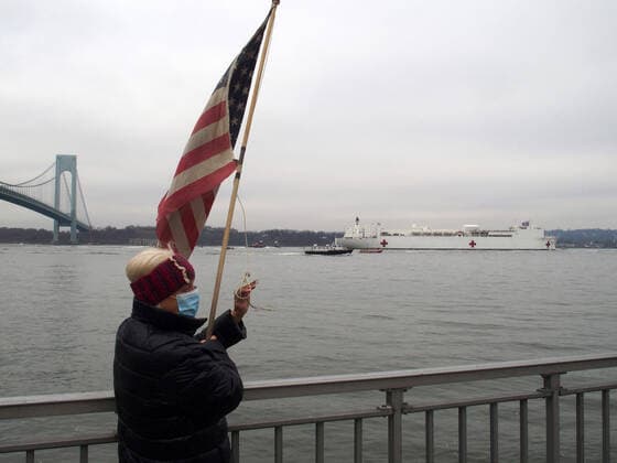 March 30, 2020, New York, New York, USA: The Hospital Ship USNS Comfort arrives in New York. USNS Comfort sail under the Verrazano Narrows bridge then proceeds to go past the Statue of Liberty to it s berth at pier 90 on the Westside of Manhattan New York USA - ZUMAct2_ 20200330_zaf_ct2_022 Copyright: xBrucexCotlerx
