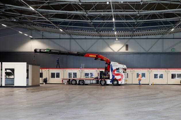 2020-03-30 14:03:25 Beds and other equipment are brought in Ahoy in Rotterdam, The Netherlands on 30 March 2020. The event location will become an extra facility for patients who need care but do not need to go to the hospital. According to Ahoy, patients with corona can go, but also other patients. ANP PIETER STAM DE YOUNG  Copyright: xANPx xPIETERxSTAMxDExJONGEx x409134288x