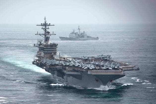March 4, 2020, Pacific Ocean, United States: The U.S. Navy Nimitz-class aircraft carrier USS Theodore Roosevelt and guided-missile cruiser USS Bunker Hill transit in formation March 4, 2020 in the Pacific Ocean. Pacific Ocean United States - ZUMAp138 20200304_zaa_p138_037 Copyright: xAnthonyxJ.xRivera U.S.xMarinesx