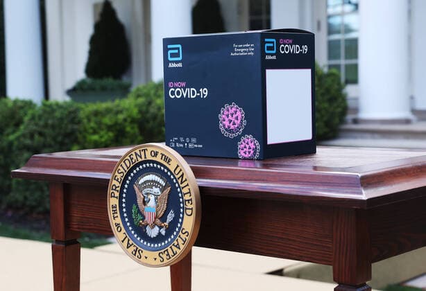 March 30, 2020, Washington, District of Columbia, USA: A box for Abbott s ID NOW COVID-19 test kit on a table before the start of a press briefing by the Coronavirus Task Force on the coronavirus and COVID-19 pandemic, in the Rose Garden at the White House, in Washington, DC, USA, 30 March 2020 Washington USA - ZUMAs152 20200330_zaa_s152_007 Copyright: xMichaelxReynoldsx