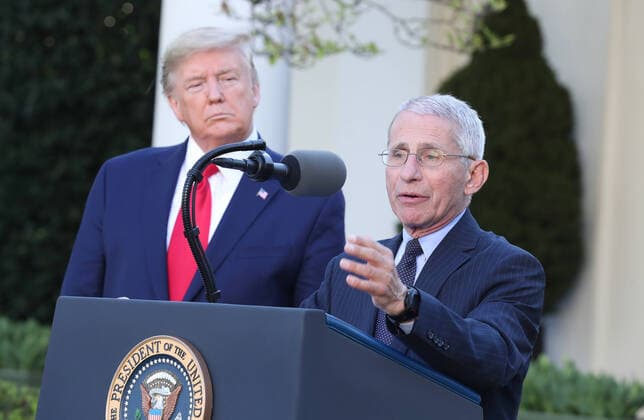 US President Donald J. Trump listens as Anthony Fauci, director of the National Institute of Allergy and Infectious Diseases (R) speaks during the Coronavirus Task Force press briefing on the coronavirus and COVID-19 pandemic, in the Rose Garden at the White House, in Washington, DC, USA, 30 March 2020. Copyright: xMichaelxReynoldsx