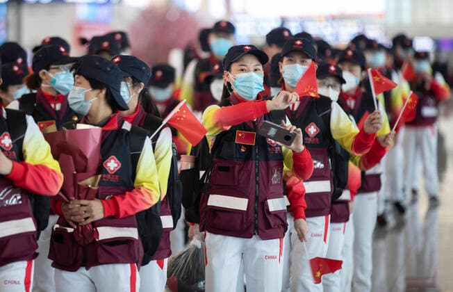 (200331) -- WUHAN, March 31, 2020 -- Members of a medical team from Zhejiang are pictured at Wuhan Tianhe International Airport in Wuhan, central China s Hubei Province, March 31, 2020. Nearly 7,000 medical workers from around China left Wuhan Tuesday after finishing their tasks. ) CHINA-HUBEI-WUHAN-MEDICAL TEAMS-RETURN FROM HUBEI (CN) FeixMaohua 