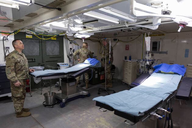 March 31, 2020, Seattle, Washington, U.S: Soldiers assemble the operating room at the field hospital in CenturyLink Field Event Center in Seattle, Washington on March 31, 2020. Soldiers from the 627th Army Hospital at Fort Carson, Colorado are deploying a field hospital for non-COVID-19 cases that will house 150 beds when completed. Seattle U.S. - ZUMAg235 20200331_zap_g235_006 Copyright: xPaulxChristianxGordonx