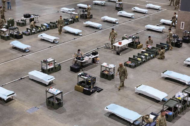 March 31, 2020, Seattle, Washington, U.S: Overview of the field hospital in CenturyLink Field Event Center in Seattle, Washington on March 31, 2020. Soldiers from the 627th Army Hospital at Fort Carson, Colorado are deploying a field hospital for non-COVID-19 cases that will house 150 beds when completed. Seattle U.S. - ZUMAg235 20200331_zap_g235_012 Copyright: xPaulxChristianxGordonx