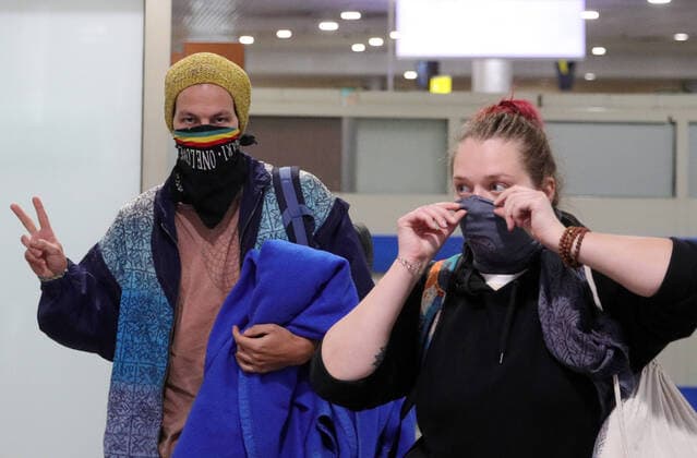 MOSCOW REGION, RUSSIA - APRIL 1, 2020: Russian citizens arriving from New Delhi at Sheremetyevo International Airport. The airport shuts down Terminal D from April 1, 2020 due to decrease of passenger flow amid the COVID-19 coronavirus pandemic. All international flights are transferred to Terminal F, internal to Terminal B. Sergei Bobylev TASS  TS0D4087