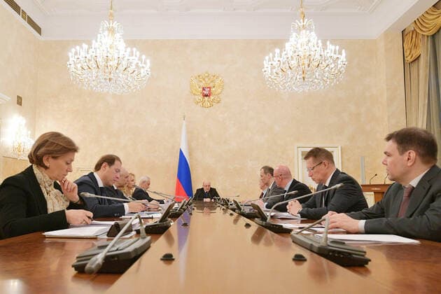 MOSCOW, RUSSIA - APRIL 1, 2020: Russia s Prime Minister Mikhail Mishustin (C) during a meeting of the Presidium of the Russian coordination council on managing the COVID-19 coronavirus at the House of the Russian Government. Alexander Astafyev POOL TASS  TS0D40C5