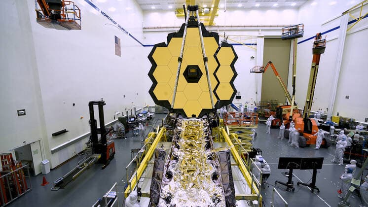 March 27, 2020, United States: This is NASAÃ¢â‚¬â ¢s $10 billion undergoing an important unfolding test. ..The space agency announced 31 March that the James Webb Space Telescope full mirror deployment was a success. ..In order to perform ground-breaking science, WebbÃ¢â‚¬â ¢s primary mirror needs to be so large that it cannot fit inside any rocket available in its fully extended form. Like the art of origami, Webb is a collection of movable parts employing applied material science that have been specifically designed to fold themselves to a compact formation that is considerably smaller than when the observatory is fully deployed. This allows it to just barely fit within a 16-foot (5-meter) payload fairing, with little room to spare. ..Ã¢â‚¬oeDeploying both wings of the telescope while part of the fully assembled observatory is another s - ZUMAc218 20200327_zia_c218_021 Copyright: xCOVERxImagesx