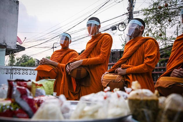 March 31, 2020, Bangkok, Abkhazia: Thai monks wearing protective masks as a preventive measure against the spread of COVID-19 pandemic receive alms in Bangkok..Thai Public Health Ministry reports 120 new cases of coronavirus (Covid-19), raising the total to 1,771 and 12 deaths. Bangkok Abkhazia - ZUMAs197 20200331_zaa_s197_130 Copyright: xPrawetxPuengsawangpholx