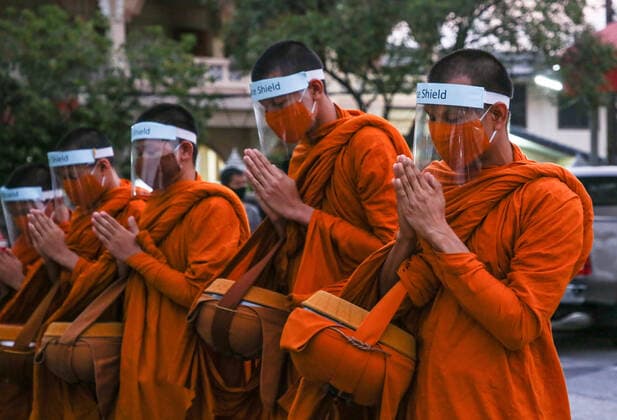 March 31, 2020, Bangkok, Abkhazia: Thai monks wearing protective masks as a preventive measure against the spread of COVID-19 pandemic are seen on the streets of Bangkok..Thai Public Health Ministry reports 120 new cases of coronavirus (Covid-19), raising the total to 1,771 and 12 deaths. Bangkok Abkhazia - ZUMAs197 20200331_zaa_s197_132 Copyright: xPrawetxPuengsawangpholx