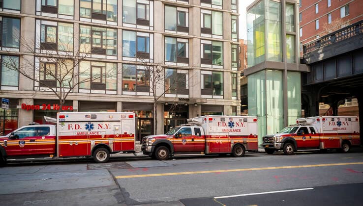 New York during the COVID-19 pandemic Ambulances parked outside of EMS Station Number 7 under the High Line Park in the Chelsea neighborhood of New York on Wednesday, April 1, 2020. FEMA is reported to be sending 250 ambulances with crews to New York to help ease the burden on FDNY EMT™s and paramedics due to the unprecedented number of calls. (  RichardxB.xLevine