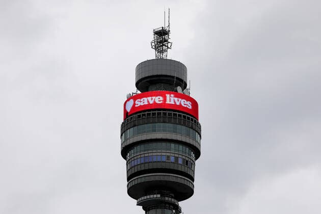 (200401) -- LONDON, April 1, 2020 (Xinhua) -- The BT Tower displays a message Save lives in London, Britain, on April 1, 2020. According to the Department of Health and Social Care, the number of confirmed COVID-19 cases in Britain reached 29,474 as of Wednesday morning, an increase of 4,324 in 24 hours. (Photo by Tim Ireland Xinhua) BRITAIN-LONDON-COVID-19-CASES 