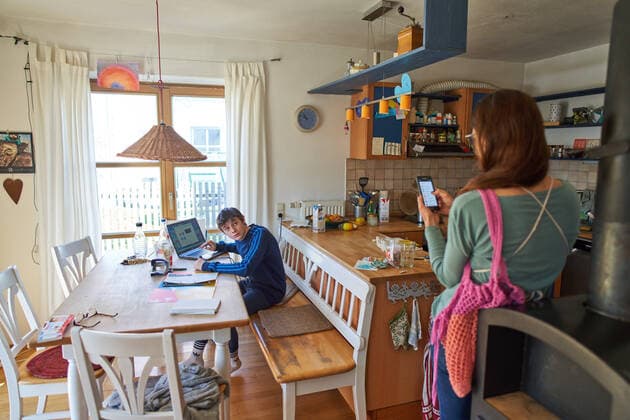Kaufbeuren, Germany, April 01, 2020. Students with mother are frustrated and fighting while learning at home with computer and iphone due to the Corona virus disease (COVID-19) on April 01, 2020 in Kaufbeuren, Germany Model released