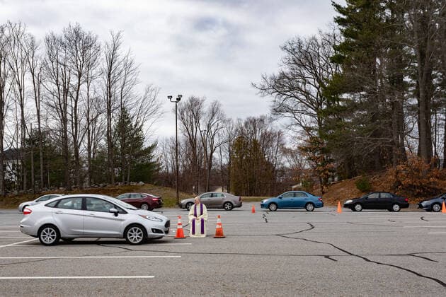 April 1, 2020, Chelmsford, Massachusetts, USA: Father Brian Mahoney at drive-up confessions in the parking lot of St. Mary Catholic Church during Covid-19 pandemic in Chelmsford.  (124964587)