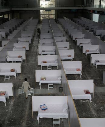 (200402) -- LAHORE, April 2, 2020 (Xinhua) -- Photo taken on April 1, 2020 shows an isolation facility for COVID-19 patients being set up at the Expo Center in eastern Pakistan s Lahore. The total number of confirmed cases of COVID-19 in Pakistan has risen to 2,071, with 26 deaths reported across the country, according to the latest data from the country s health ministry released Wednesday. (Photo by Sajjad Xinhua) PAKISTAN-LAHORE-COVID-19-TEMPORARY HOSPITAL 