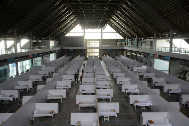 (200402) -- LAHORE, April 2, 2020 (Xinhua) -- Photo taken on April 1, 2020 shows an isolation facility for COVID-19 patients being set up at the Expo Center in eastern Pakistan s Lahore. The total number of confirmed cases of COVID-19 in Pakistan has risen to 2,071, with 26 deaths reported across the country, according to the latest data from the country s health ministry released Wednesday. (Photo by Sajjad Xinhua) PAKISTAN-LAHORE-COVID-19-TEMPORARY HOSPITAL 