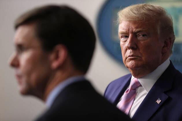 April 1, 2020, Washington, District of Columbia, USA: United States President Donald J. Trump, listens to US Secretary of Defense Dr. Mark T. Esper speak during the daily briefing on the novel coronavirus, COVID-19, in the Brady Press Briefing Room of the White House on April 1, 2020 in Washington, DC Washington USA - ZUMAs152 20200401_zaa_s152_028 Copyright: xOliverxContrerasx