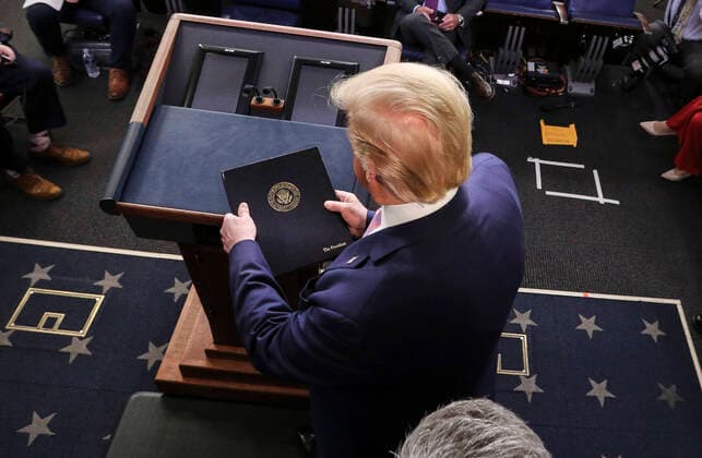 April 1, 2020, Washington, District of Columbia, USA: United States President Donald J. Trump arrives during the daily briefing on the novel coronavirus, COVID-19, in the Brady Press Briefing Room of the White House on April 1, 2020 in Washington, DC Washington USA - ZUMAs152 20200401_zaa_s152_054 Copyright: xOliverxContrerasx