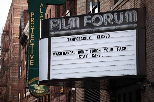 200401 A temporarily closed sign at Film Forum with the text Wash hands. Don?t touch your face. Stay Safe as the coronavirus, COVID-19, outbreak continues on April 1, 2020 in New York, NY, USA. Across the city businesses, schools and places of work have been shutting down, leading to empty streets and quiet neighborhoods. Photo: Joel Marklund BILDBYRAN kod JM 88128 bbeng coronavirus covid-19 virus corona sjukdom Copyright: JOELxMARKLUND 47112343st