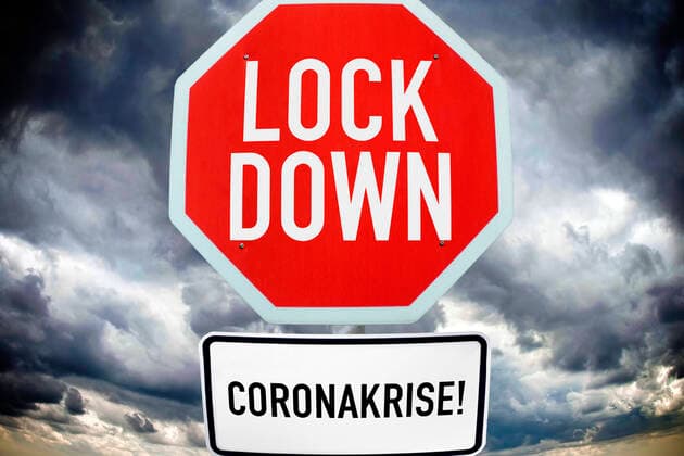 FOTOMONTAGE, Schild mit der Aufschrift Lockdown, Symbolfoto Corona-Lockdown