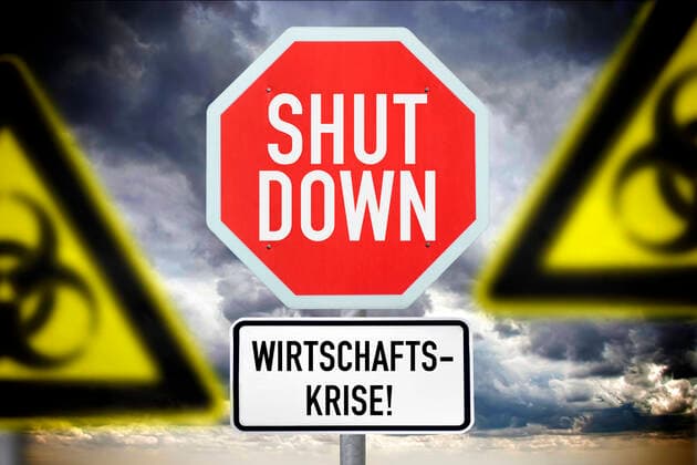FOTOMONTAGE, Schilder mit Aufschrift Shutdown und Wirtschaftskrise und BiogefÃ¤hrdungsschilder, Symbolfoto Corona-Shutdown