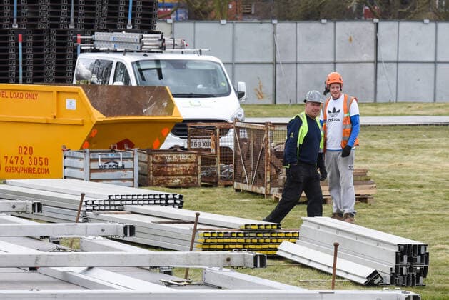 . 02 04 2020. London, United Kingdom. Coronavirus crisis. Builders seen carrying out works for the new mortuary on Manor Park. A new mortuary for coronavirus victims, is been building on forest land next to the City of London Cemetery and Crematorium and is expected to take the dead from the new Nightingale Hospital at the ExCel Centre.  xGustavoxValientex xi-Imagesx IIM-20974-0020
