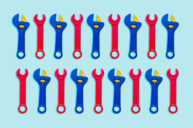 Illustration of two rows of red and blue toy wrenches  GEMF03485