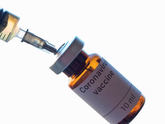 April 2, 2020, Ukraine: In this photo illustration a vial labelled Coronavirus vaccine and syringe are seen on display..The world is anxiously awaiting for a vaccine against coronavirus. Ukraine - ZUMAs197 20200402_zab_s197_010 Copyright: xIgorxGolovniovx