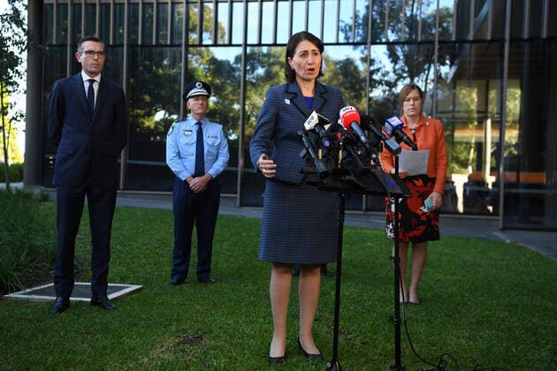 GLADYS BEREJIKLIAN COVID-19 UPDATE, Premier Gladys Berejiklian (centre) is seen updating the NSW public on the latest coronavirus measures and statistics, in Sydney, Friday, April 3, 2020. ( NO ARCHIVING, EDITORIAL USE ONLY, NO USE IN BOOKS WITHOUT CONSENT SYDNEY NSW AUSTRALIA  Copyright: xDEANxLEWINSx 20200403001461525506