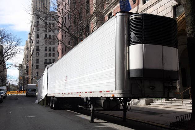 April 2, 2020, New York City, New York, US: Hectic scene at an overwhelmed Lennox Hill Hospital on Manhattan s East-side on 2 April, 2020, with some coronavirus (COVID-19) patients being transported to the hospital and others being moved. Pictured is a refrigerated truck, to be used as a temporary morgue, on stand-by at the hospital. New York City US - ZUMAl135 20200402_zap_l135_022 Copyright: xG.xRonaldxLopezx