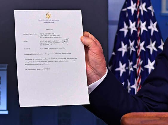United States President Donald J. Trump holds a memo stating he tested negative during a Coronavirus briefing at the White House on Thursday, April 2, 2020 in Washington, DC. Due to the COVID-19 pandemic, at least 5,700 people have died in the United States with more than 200,000 infected. More than 10 million people have lost their jobs in the U.S. in the past two weeks. Copyright: xKevinxDietschx
