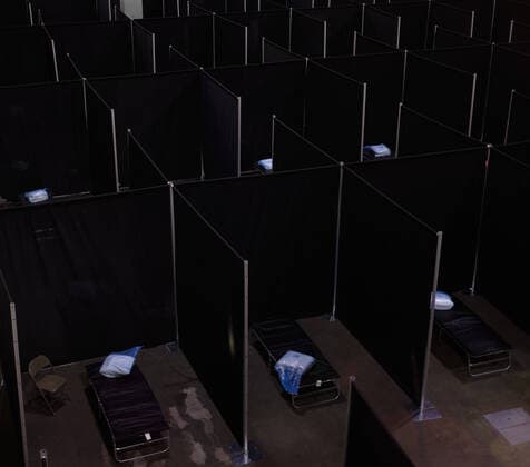 April 2, 2020, Worcester, Massachusetts, US: The Massachusetts National Guard in cooperation with FEMA and Umass Memorial Medical Cenetr are building a COVID-19, Corona Virus, field hospital to treat midlly ill paitents at the DCU Center in Worcester, Massachusetts. The facility will have 250 beds for those who are too sick to be home, but not in need of an Intensive Care Unit. Worcester US - ZUMAd211 20200402_zap_d211_015 Copyright: xAllisonxDinnerx