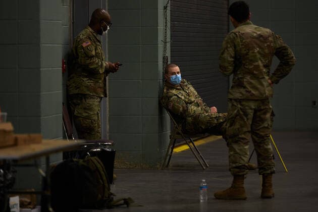 April 2, 2020, Worcester, Massachusetts, US: The Massachusetts National Guard in cooperation with FEMA and Umass Memorial Medical Cenetr are building a COVID-19, Corona Virus, field hospital to treat midlly ill paitents at the DCU Center in Worcester, Massachusetts. The facility will have 250 beds for those who are too sick to be home, but not in need of an Intensive Care Unit. Worcester US - ZUMAd211 20200402_zap_d211_024 Copyright: xAllisonxDinnerx