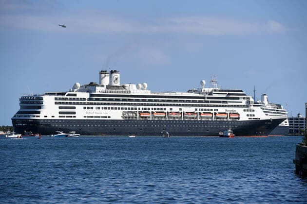 FORT LAUDERDALE FL - APRIL 02: The Rotterdam cruise ship a arrives at Port Everglades as the Zaandam cruise ship is docked. The Holland America cruise ship had been at sea for the past 19 days after South American ports denied their entry due to the coronavirus outbreak after people tested positive for COVID-19. on April 2, 2020 in Fort Lauderdale, Florida. Copyright: xmpi04x
