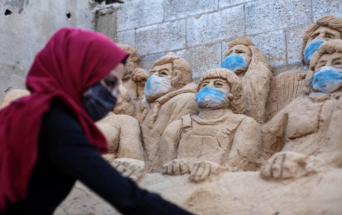April 3, 2020, Gaza City, Gaza Strip, Palestinian Territory: A Palestinian artist Rana el-Ramlawi, 23, creates a sand sculpture stay home during awareness campaign about the spread of coronavirus disease (COVID-19), at her house Gaza city, on April 3, 2020. The United Nations has warned that a COVID-19 outbreak in Gaza could be disastrous, given the high poverty rates and weak health system in the coastal strip under Israeli blockade since 2007. Authorities in Gaza have said that more than 2,700 Palestinians are in home-isolation, mostly people who had returned from Egypt Gaza City Palestinian Territory - ZUMAap3_ 20200403_zaf_ap3_047 Copyright: xMahmoudxAjjourx