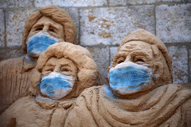 April 3, 2020, Gaza City, Gaza Strip, Palestinian Territory: A Palestinian artist Rana el-Ramlawi, 23, creates a sand sculpture stay home during awareness campaign about the spread of coronavirus disease (COVID-19), at her house Gaza city, on April 3, 2020. The United Nations has warned that a COVID-19 outbreak in Gaza could be disastrous, given the high poverty rates and weak health system in the coastal strip under Israeli blockade since 2007. Authorities in Gaza have said that more than 2,700 Palestinians are in home-isolation, mostly people who had returned from Egypt Gaza City Palestinian Territory - ZUMAap3_ 20200403_zaf_ap3_048 Copyright: xMahmoudxAjjourx