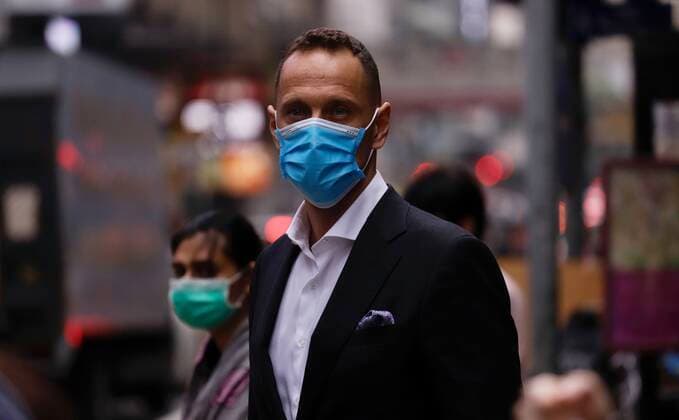 April 3, 2020, Hong Kong, CHINA: A masked male Caucasian in the financial hub in Central. WHO have issued a warning that global infections of coronavirus introduced by China Pneumonia is almost reaching 1 million, continue to spread worldwide in alarming speed showing no sign of dissipation.April-3,2020 Hong Kong.ZUMA Hong Kong CHINA - ZUMAl137 20200403_zap_l137_005 Copyright: xLiauxChung-renx