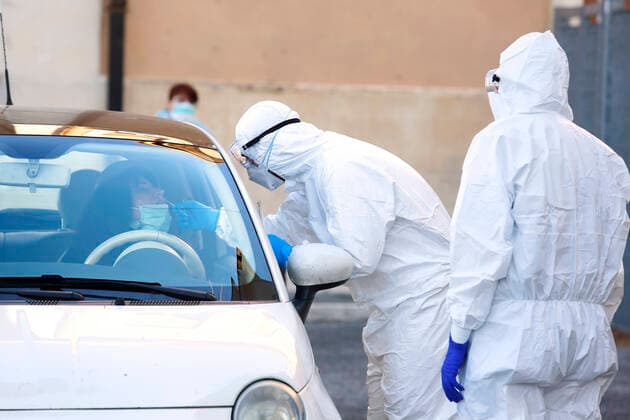Rome April 4th 2020. Santa Maria della Pieta . Coronavirus emergency. Due to the spread of Covid-19 virus, Italy started a new procedure, a drive-through COVID-19 pharyngeal and nasal swab to test possible positivity to the infection . In the pictures, medical workers testing doctors and nurses of San Filippo Neri hospital. Photo Samantha Zucchi Insidefoto SamanthaxZucchi