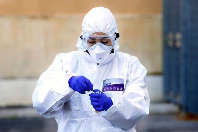 Rome April 4th 2020. Santa Maria della Pieta . Coronavirus emergency. Due to the spread of Covid-19 virus, Italy started a new procedure, a drive-through COVID-19 pharyngeal and nasal swab to test possible positivity to the infection . In the pictures, medical workers testing doctors and nurses of San Filippo Neri hospital. Photo Samantha Zucchi Insidefoto SamanthaxZucchi
