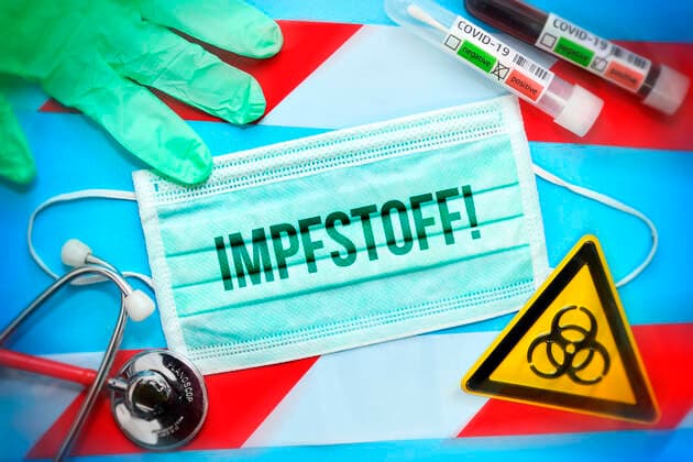 FOTOMONTAGE, Atemschutzmaske mit Aufschrift Impfstoff, Covid-19-Blutprobe, Schutzhandschuh, BiogefÃ¤hrdungsschild, Stethoskop und Absperrband, Symbolfoto Coronavirus-Krise