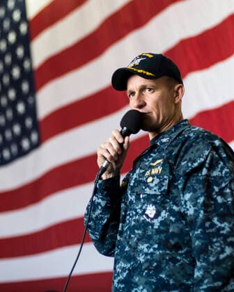 April 8, 2016, Yokosuka, Japan: U.S. Navy Capt. Brett Crozier, commanding officer of the aircraft carrier USS Theodore Roosevelt speaks to sailors during a ceremony in the hangar bay June 2, 2016 in Yokosuka, Japan. Crozier was relieved of duty March 31, 2020 after writing a four-page letter to his superiors, pleading with them to take action to help stem the spread of COVID-19 cases on his ship. Yokosuka Japan - ZUMAp138 20160408_zaa_p138_060 Copyright: xRyanxMcfarlane Planetpixx