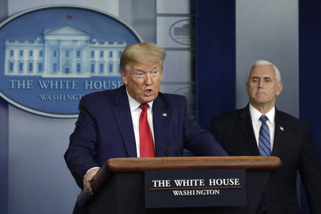 U.S. President Donald Trump speaks next to Vice President Mike Pence at a press briefing on the COVID-19 pandemic with members of the Coronavirus Task Force at the White House in Washington, DC on Friday, April 3, 2020.  WAX20200403215 YURIxGRIPAS