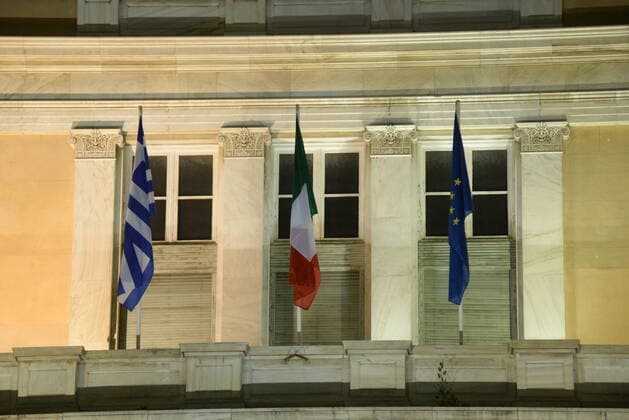 Greece: Indication of support for Italy amid COVID-19 Flags of Greece (left), Italy (centre) and of EU (right) in the Greek parliament, as a sign of support, cause of Covid-19. Athens Attiki Greece Copyright: DimitriosxKarvountzis