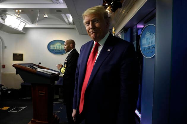 April 3, 2020, Washington, District of Columbia, USA: United States President Donald J. Trump waits aside as US Surgeon General Vice Admiral (VADM) Jerome M. Adams, M.D., M.P.H., speaks during a press briefing on the COVID-19 pandemic with members of the Coronavirus Task Force at the White House in Washington on April 3, 2020. .Credit: Pool via CNP Washington USA - ZUMAs152 20200403_zaa_s152_081 Copyright: xYurixGripasx