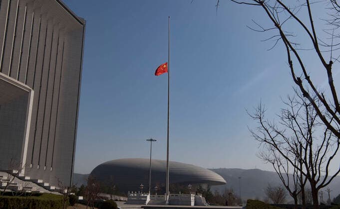 (200404) -- SHENMU, April 4, 2020 -- A Chinese national flag flies at half-mast to mourn for martyrs who died in the fight against the novel coronavirus disease (COVID-19) outbreak and compatriots died of the disease in Shenmu, northwest China s Shaanxi Province, April 4, 2020. ) CHINA-COVID-19 VICTIMS-NATIONAL MOURNING (CN) TaoxMing 