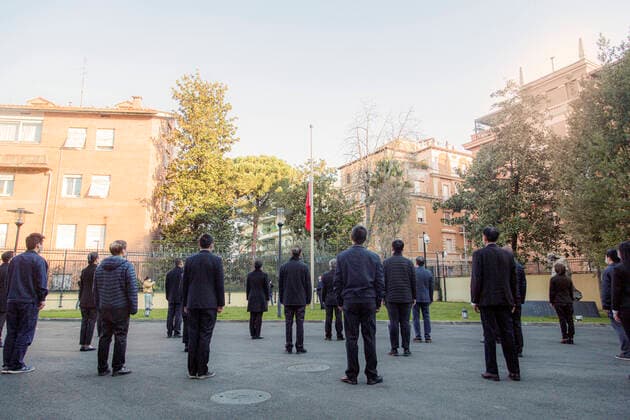 (200404) -- ROME, April 4, 2020 -- A Chinese national flag flies at half-mast to mourn for martyrs who died in the fight against the novel coronavirus disease (COVID-19) outbreak and compatriots who died of the disease at the Chinese Embassy to Italy in Rome, Italy, April 4, 2020. (Photo by Xinhua) ITALY-ROME-COVID-19-CHINESE EMBASSY-NATIONAL FLAG-HALF-MAST GongxQing 