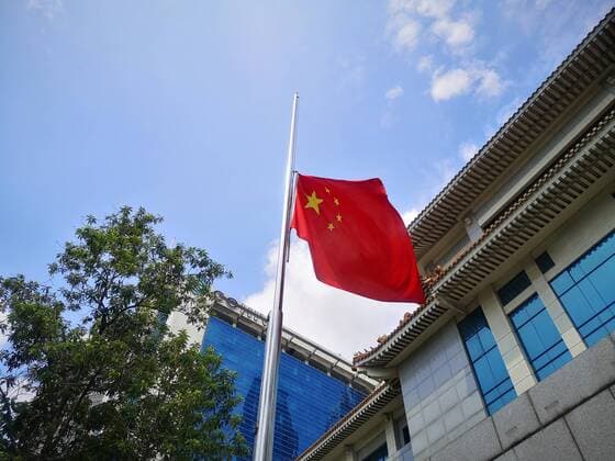 (200404) -- JAKARTA, April 4, 2020 -- A Chinese national flag flies at half-mast to mourn for martyrs who died in the fight against the novel coronavirus disease (COVID-19) outbreak and compatriots who died of the disease at the Chinese Embassy to Indonesia in Jakarta, Indonesia, April 4, 2020. (Photo by Xinhua) INDONESIA-JAKARTA-COVID-19-CHINESE EMBASSY-NATIONAL FLAG-HALF-MAST DuxBin 