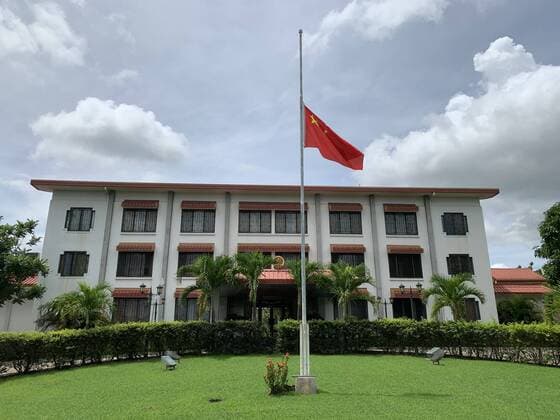 (200404) -- PORT MORESBY, April 4, 2020 -- A Chinese national flag flies at half-mast to mourn for martyrs who died in the fight against the novel coronavirus disease (COVID-19) outbreak and compatriots who died of the disease at the Chinese Embassy to Papua New Guinea in Port Moresby, Papua New Guinea, April 4, 2020. (Chinese Embassy to Papua New Guinea Handout via Xinhua) PAPUA NEW GUINEA-PORT MORESBY-COVID-19-CHINESE EMBASSY-NATIONAL FLAG-HALF-MAST BaixXuefei 
