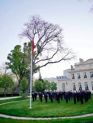(200404) -- PARIS, April 4, 2020 -- A Chinese national flag flies at half-mast to mourn for martyrs who died in the fight against the novel coronavirus disease (COVID-19) outbreak and compatriots who died of the disease at the Chinese Embassy to France in Paris, France, April 4, 2020. (Photo by Zou Heyi Xinhua) FRANCE-PARIS-COVID-19-CHINESE EMBASSY-NATIONAL FLAG-HALF-MAST GaoxJing 