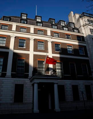 (200404) -- LONDON, April 4, 2020 -- A Chinese national flag flies at half-mast to mourn for martyrs who died in the fight against the novel coronavirus disease (COVID-19) outbreak and compatriots who died of the disease at the Chinese Embassy to the United Kingdom in London, Britain, April 4, 2020. ) BRITAIN-LONDON-COVID-19-CHINESE EMBASSY-NATIONAL FLAG-HALF-MAST HanxYan 